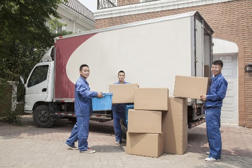 Moving van and packed boxes for a home move in Anerley