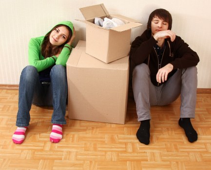 Office furniture and equipment being prepared for a business move