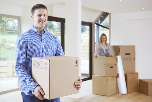 Packed office equipment and documents ready for a local move in Anerley